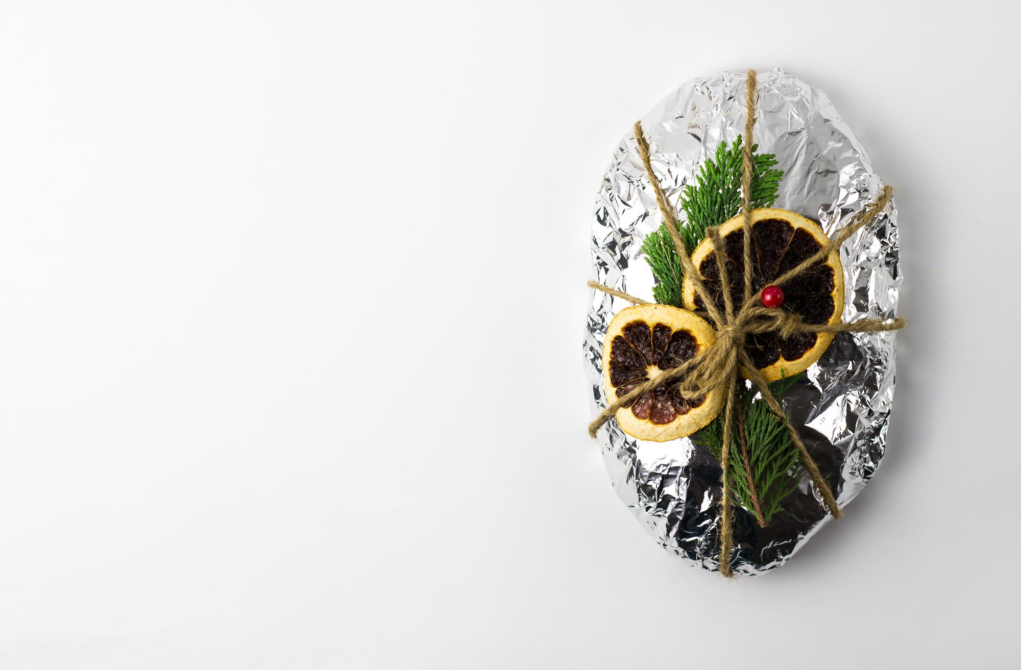 Large editorial shot of plated seasonal main course on textured paper