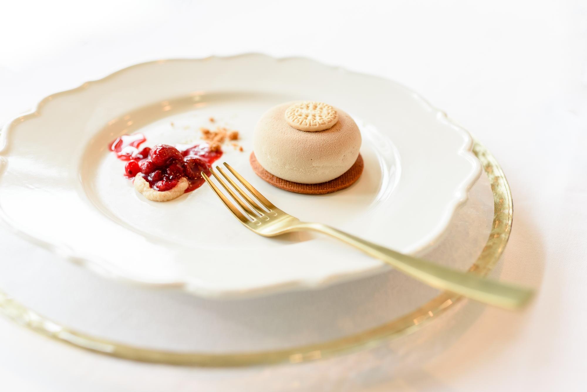 Close-up of plated dessert with gold leaf